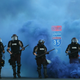 State police advance in a riot line on protesters in Minneapolis on May 30, 2020.